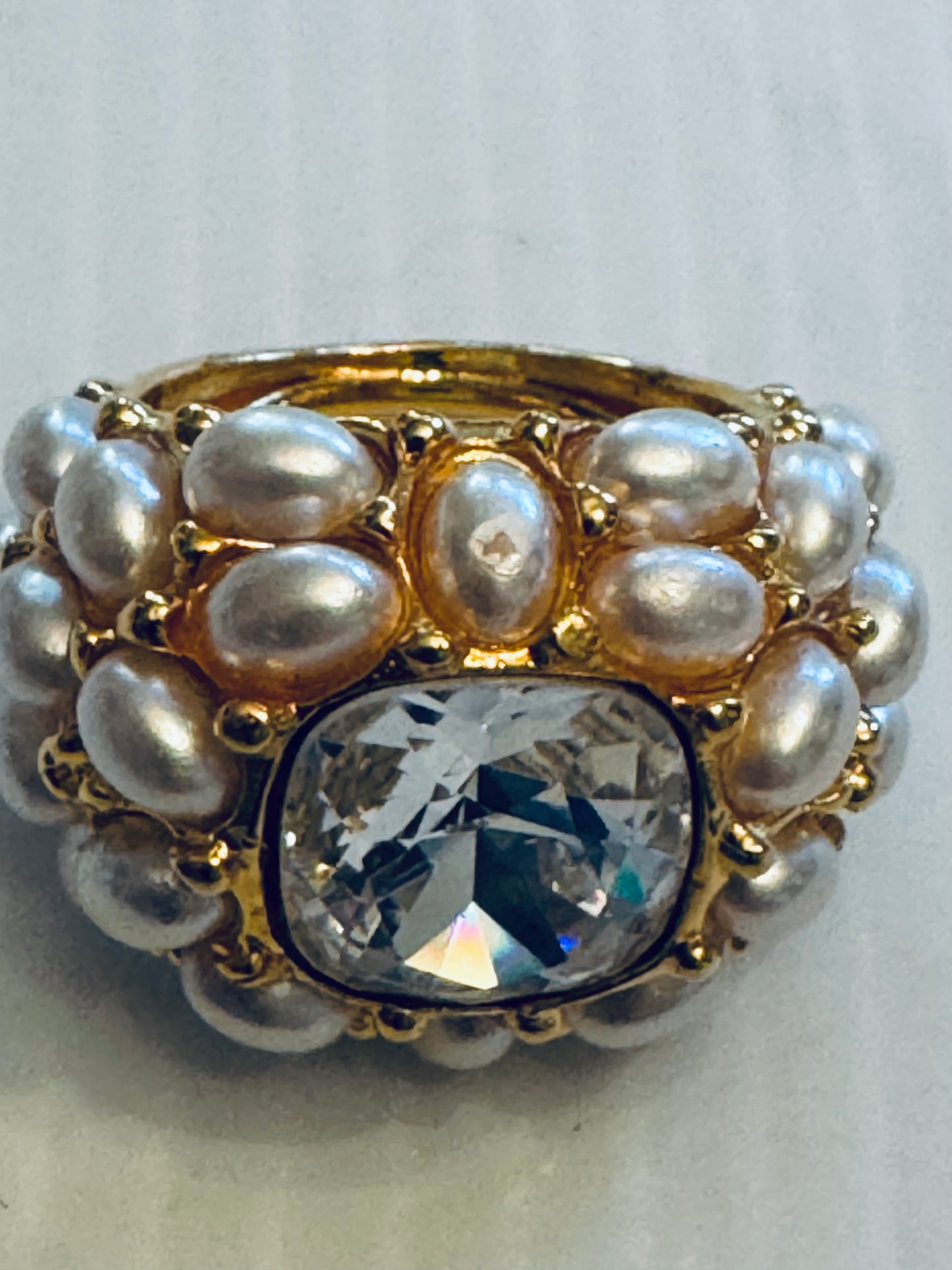 Beautiful vintage KJL gold tone ring with pearls and jumbo clear rhinestone center stone
