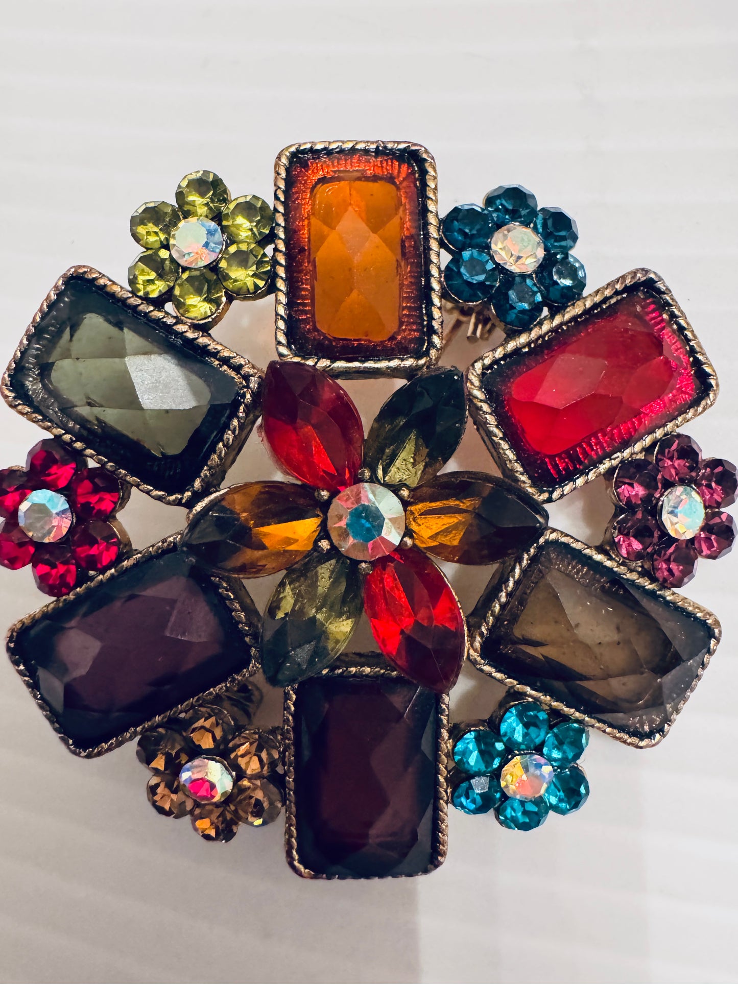 Vintage, colorful brooch with mini flowers and flower rhinestone center