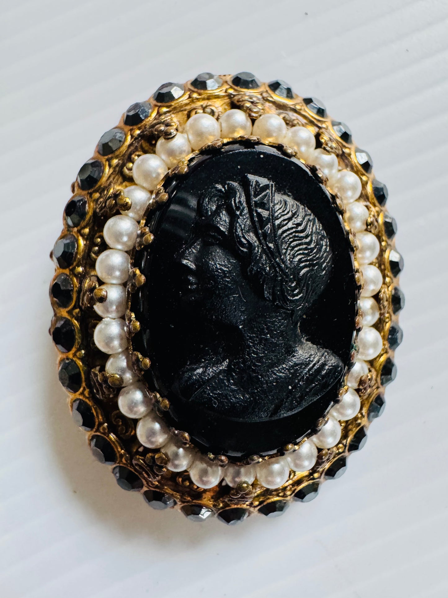 Beautiful 1950s black cameo with pearls. Sourced in Paris.