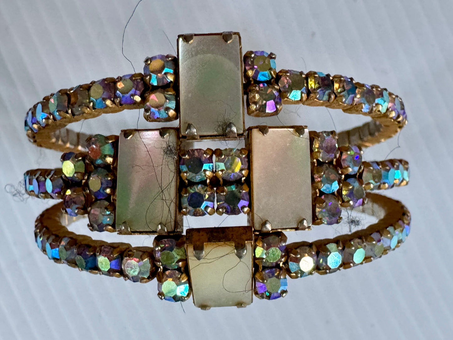 Stunning rhinestone bracelet with mother of pearl detail. Sourced in Paris.