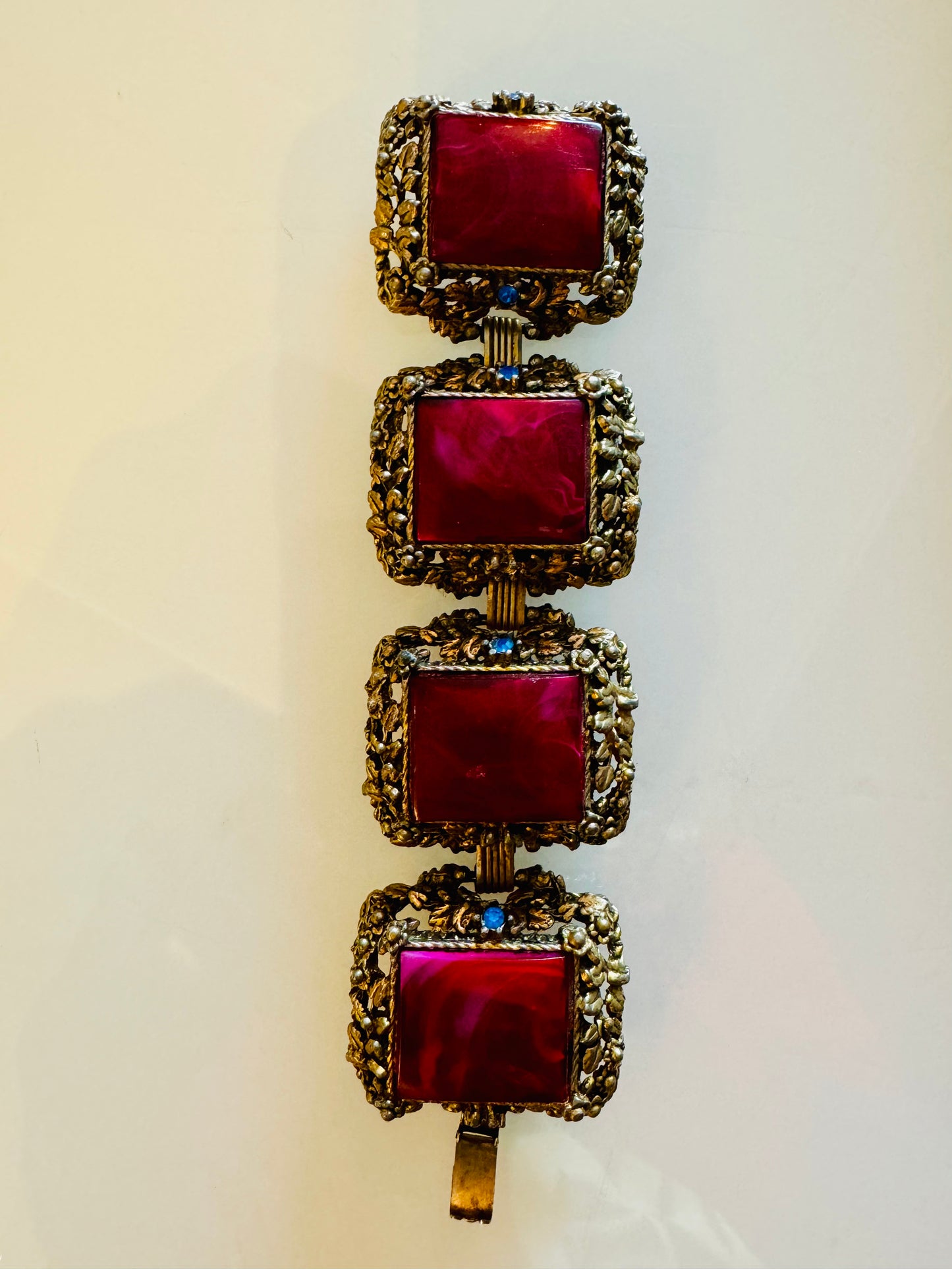 1950s gold tone jumbo bracelet with red stones and rhinestones. Oscar worthy!
