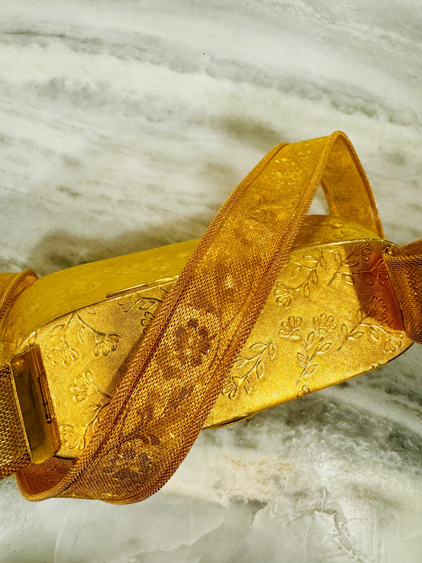 RARE Rosenfeld metal hard shell and brass strap with flower engraving found in pristine condition. Velvet lining. Made in Italy. Precious.