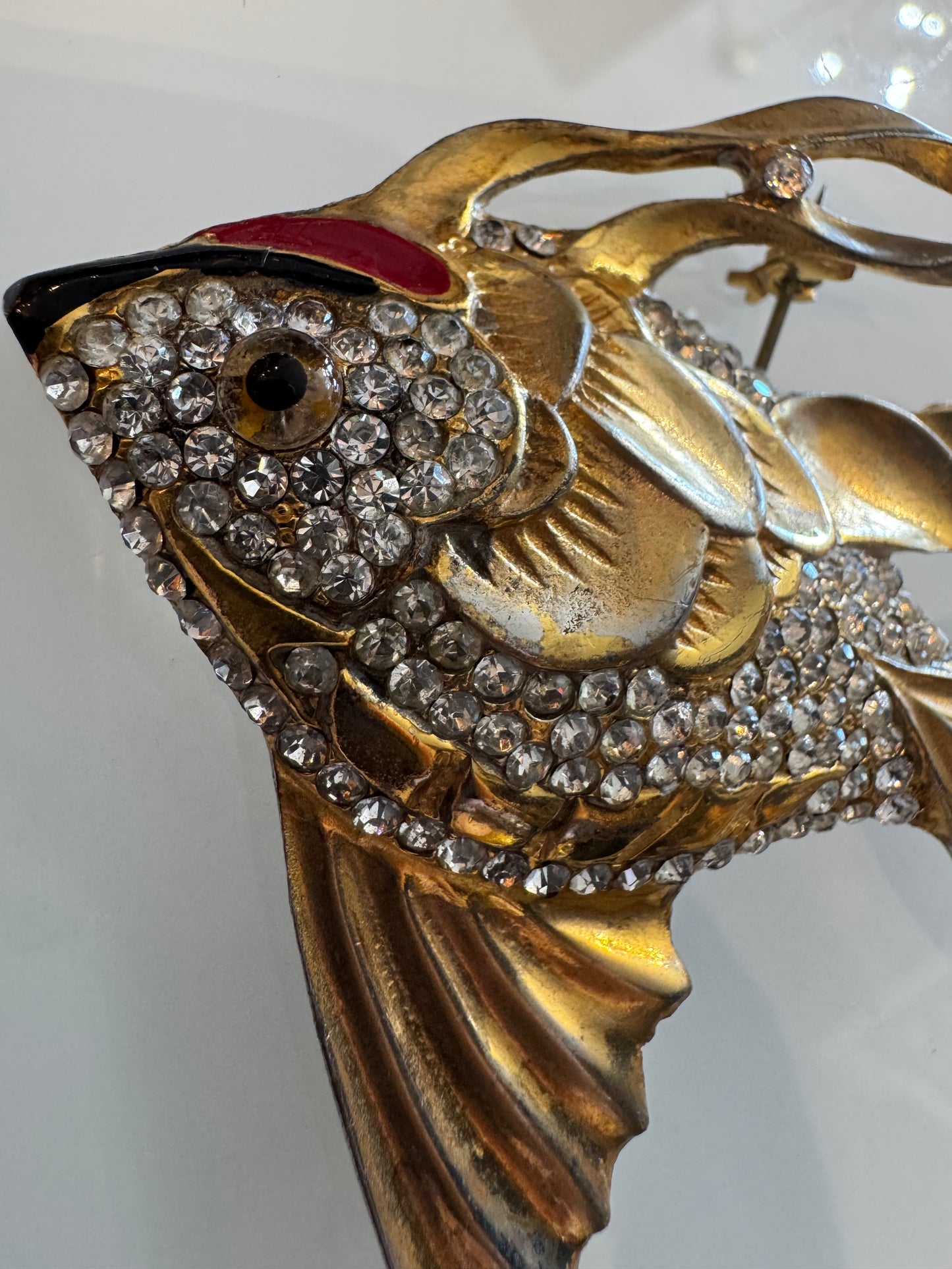 1940s fish brooch with glass eye and rhinestone/ enamel body