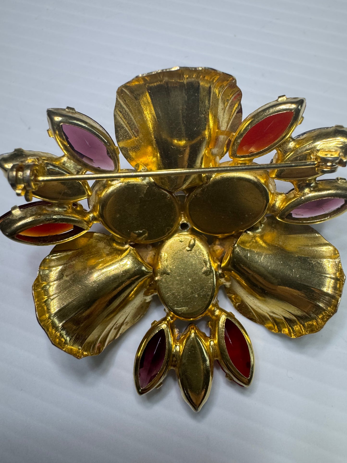 DELIZZA & ELSTER beautiful vintage brooch with purple blue, magenta, and red rhinestones