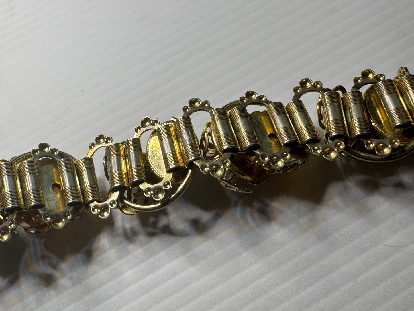 Beautiful 1940s 3-D cabochon and flower gold tone bracelet with amber colored rhinestones
