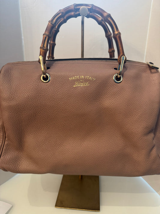 Vintage salmon colored GUCCI Boston bag with bamboo handles. Why not attach a crossbody chain sold separately