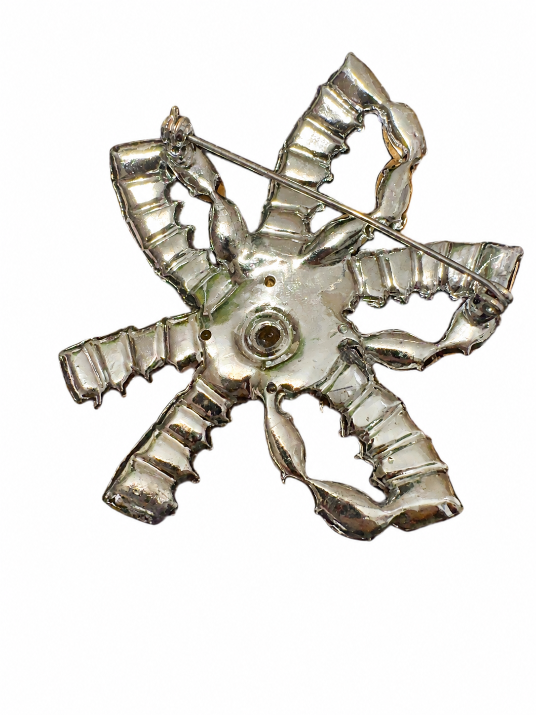 Clear rhinestone ribbon brooch with emerald-cut and navette stones in silver-tone prong settings