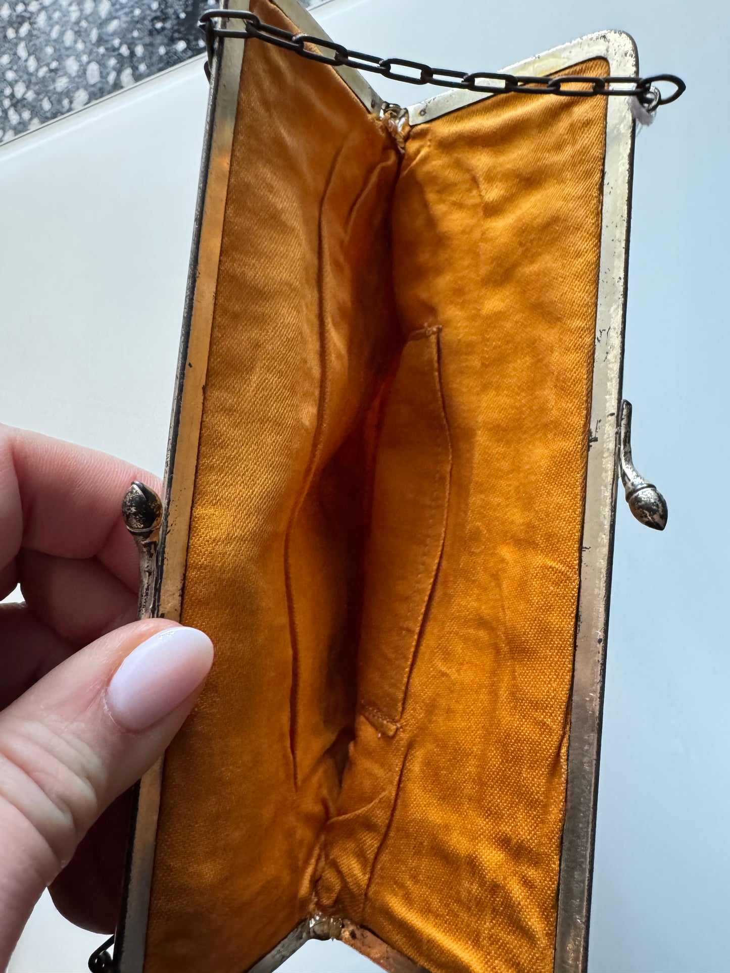 1920s vintage beaded flapper bag with silver metal hardware. Red, yellow, pink and green flower design.