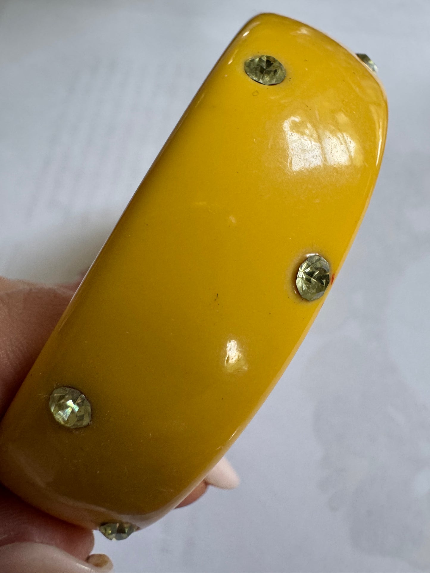 1960s bakelite yellow bracelet with scattered rhinestones