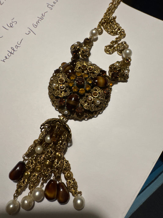 Stunning 1930s pendant necklace with tiger eye, Amber colored rhinestones, and pearls, with dangle tassel. Found in Paris.