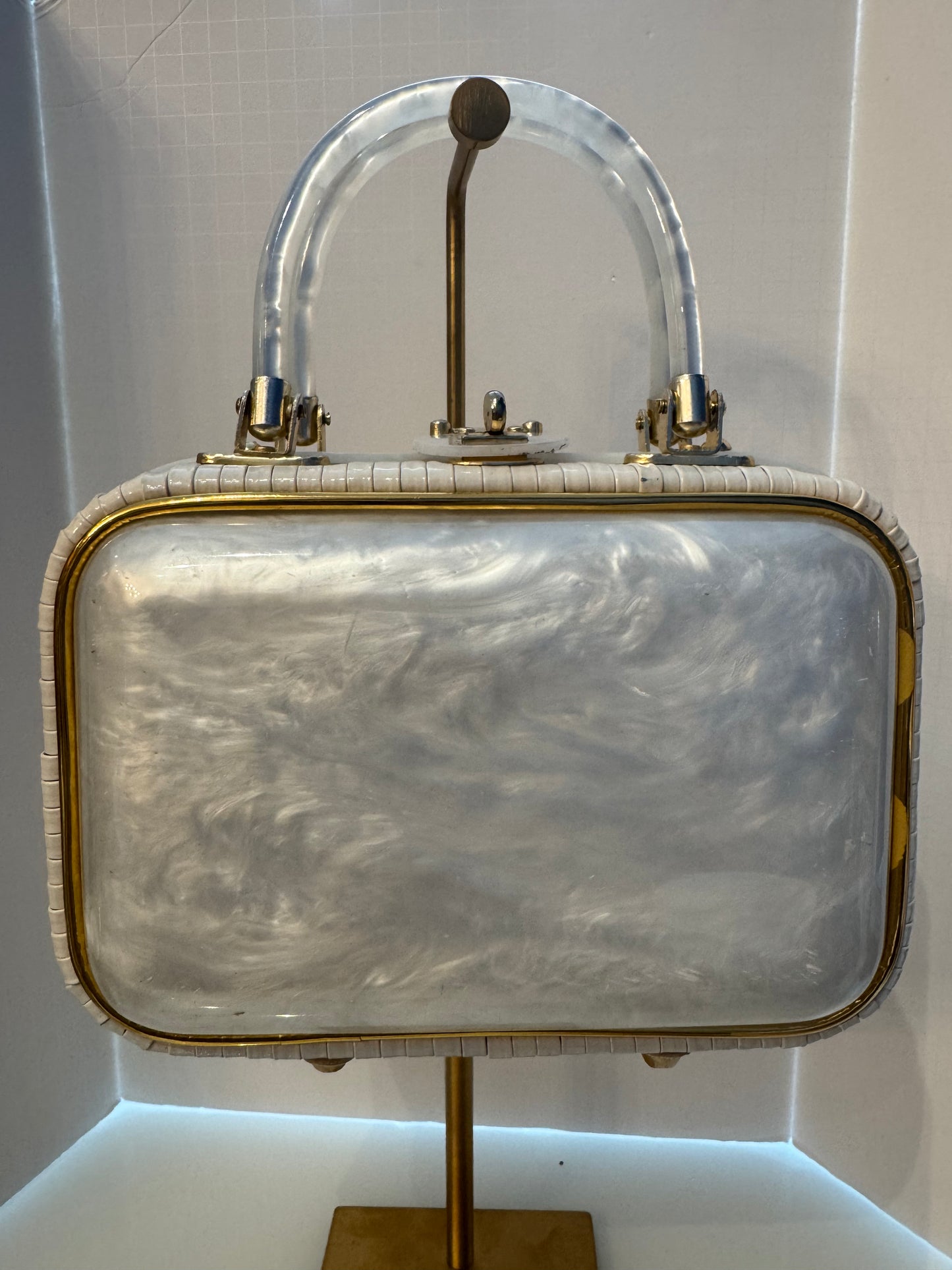 Absolutely beautiful 1950s top handle, wicker and Lucite bag. Handles and front are loose site with gold hardware back is all wicker.