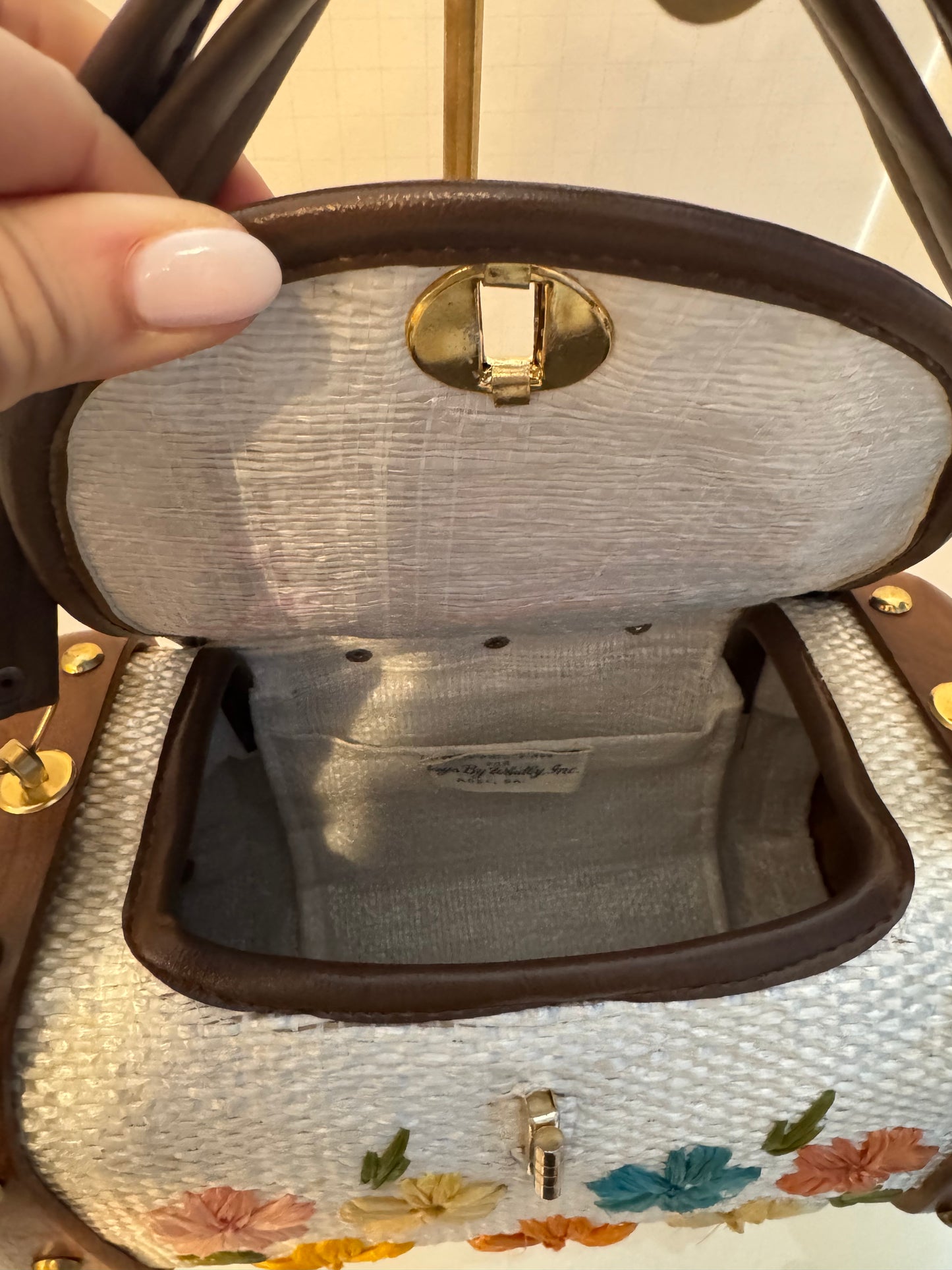 Gorgeous 1950s ivory, wicker, and wood top handle bag with embroidered flowers and gold hardware