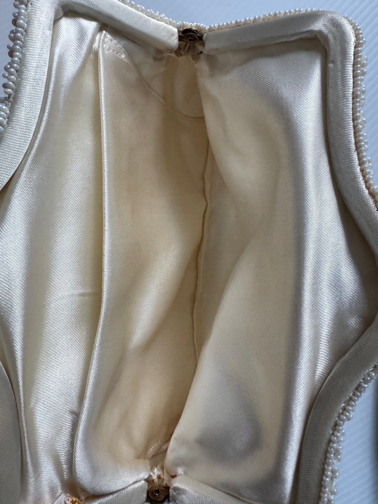 Stunning 1940s ivory beaded bag with small flowers. Sourced in Paris.