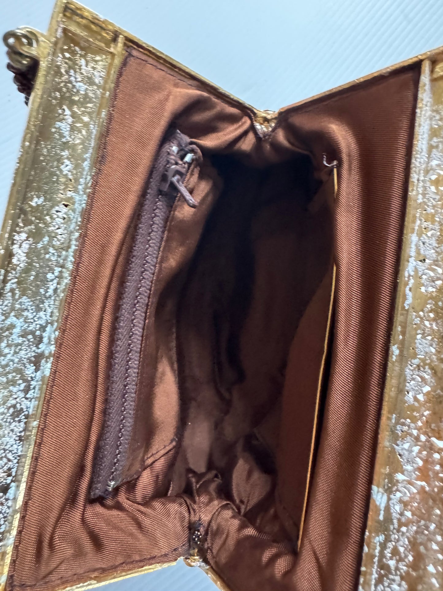 Beautiful 1940s beaded bag with brown and ivory beads, gold decorative hardware and beautiful interior. Sourced in Paris.