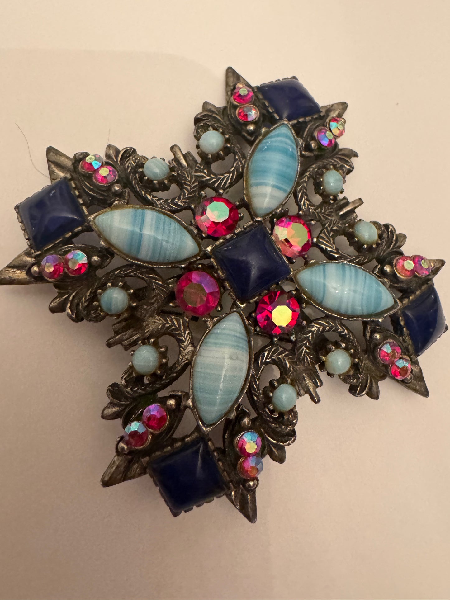 Vintage Maltese, cross and variations of blue with red aurora borealis stones