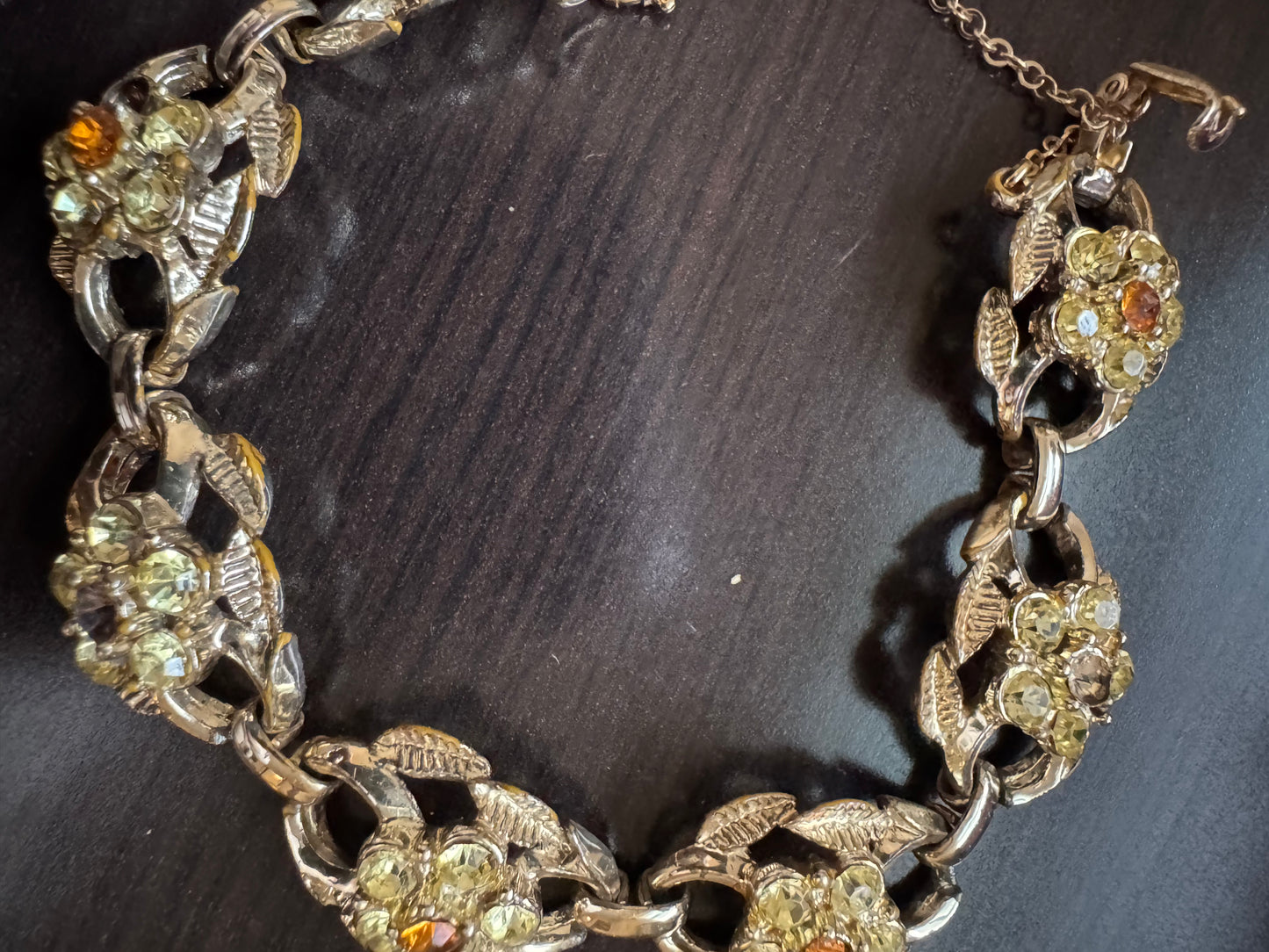 signed CORO Amber colored rhinestone, gold tone bracelet