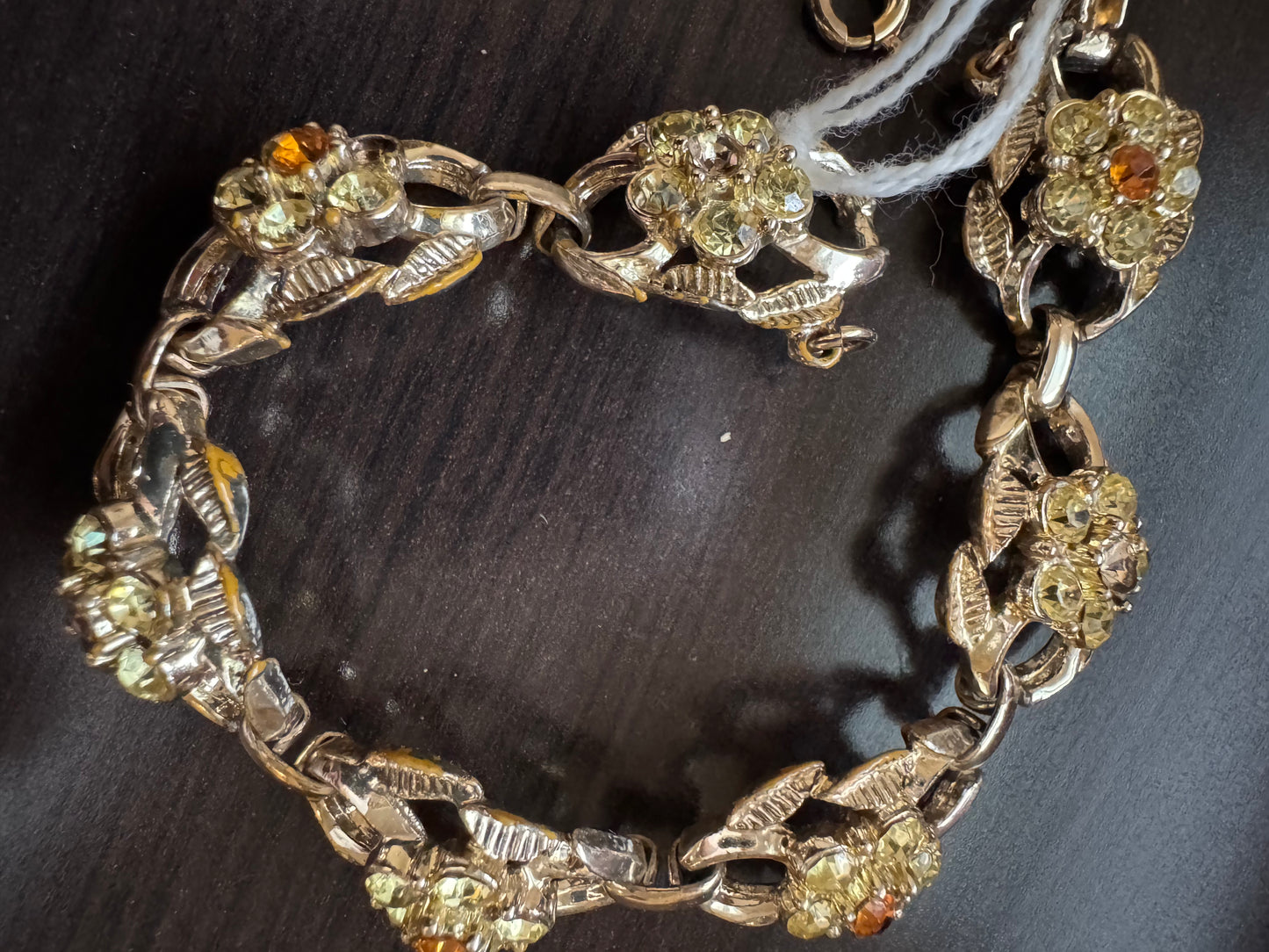 signed CORO Amber colored rhinestone, gold tone bracelet