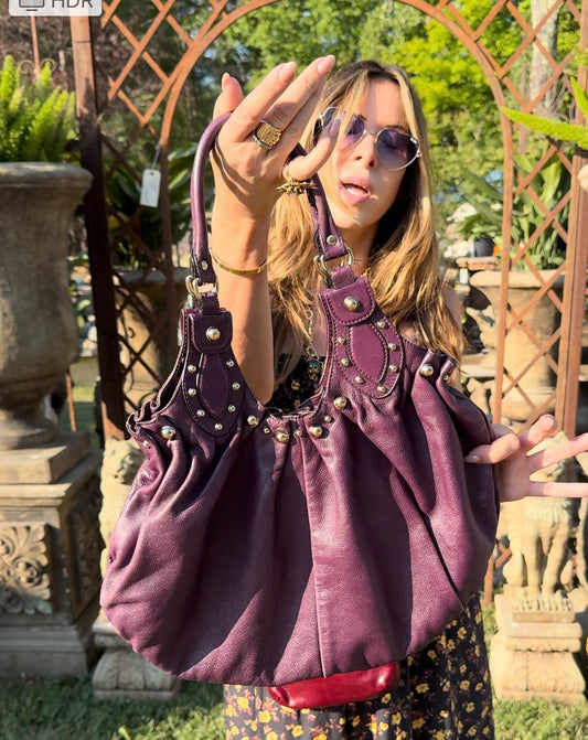 Vintage leather eggplant colored Gucci with silver studs