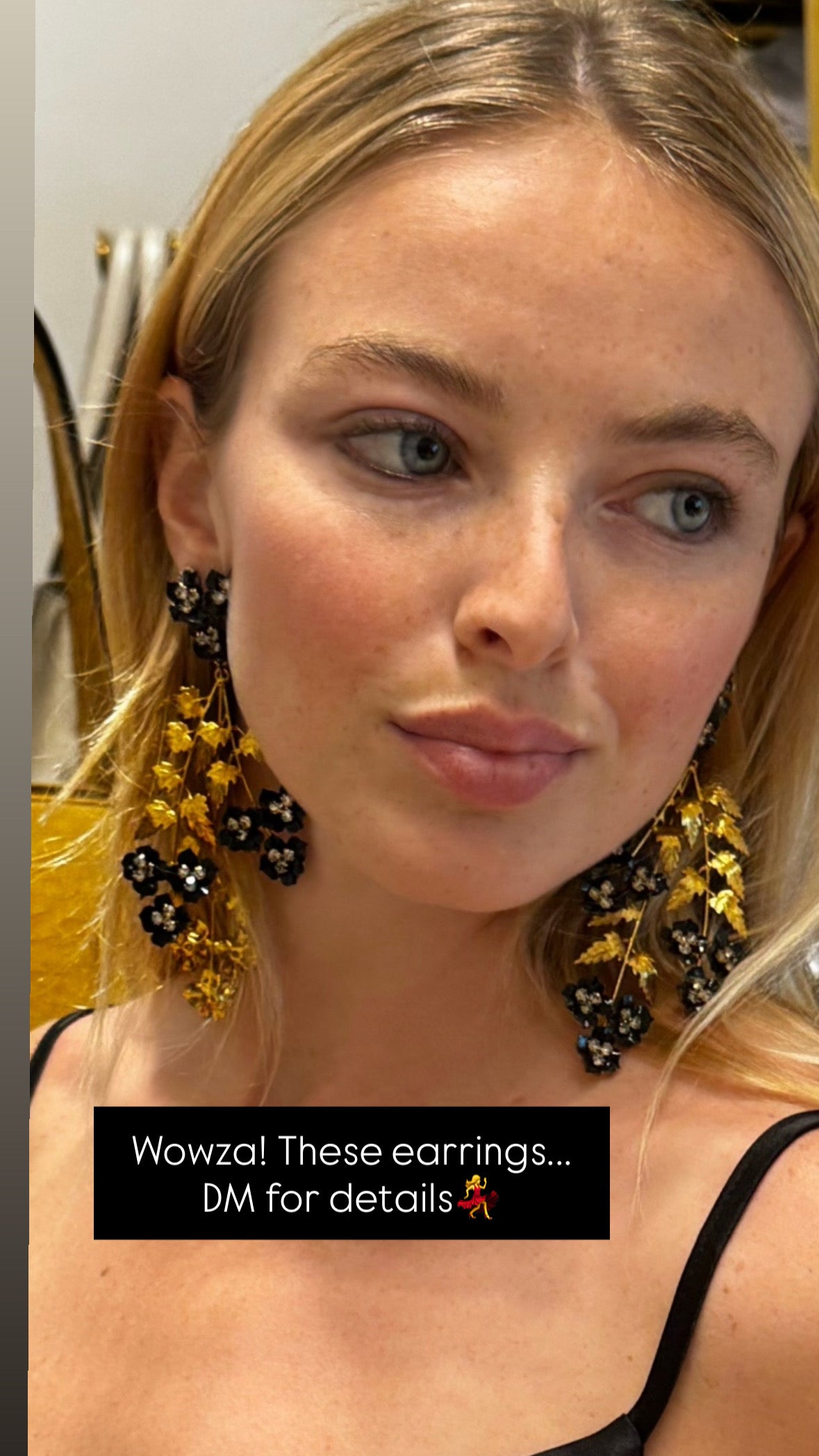 Stunning vintage gold tone leaf and rhinestone flower articulated dangle pierced earrings.