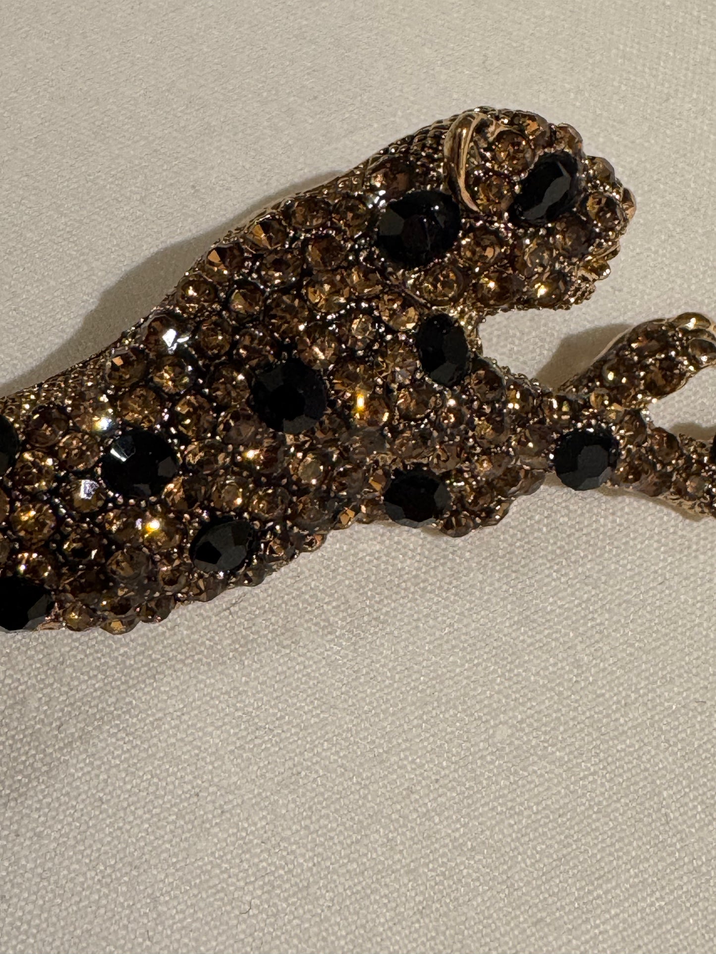 vintage 1980s sleek panther rhinestone brooch. Sourced in Paris.