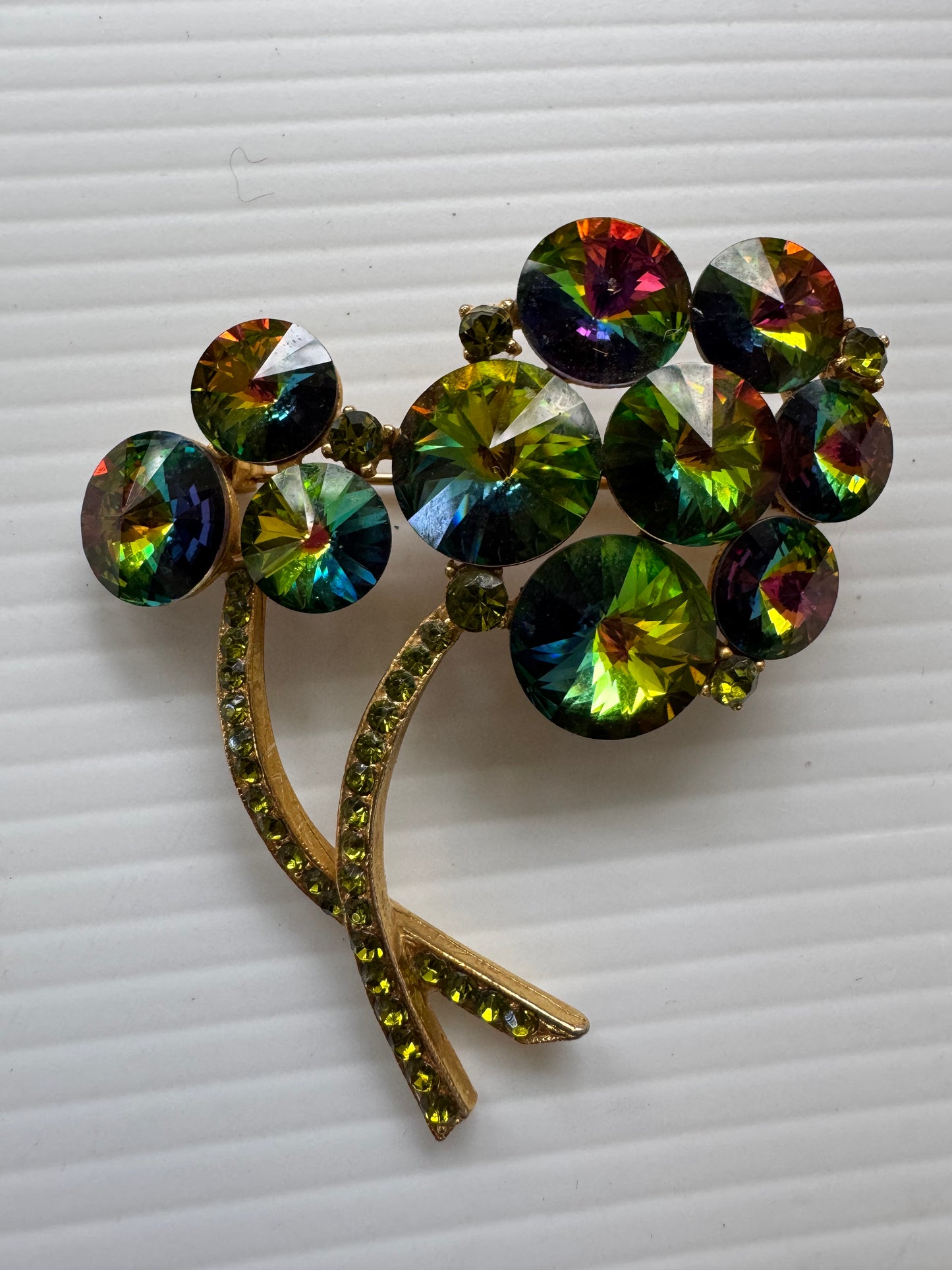 Beautiful 1950s signed watermelon flower brooch with green rhinestone stems
