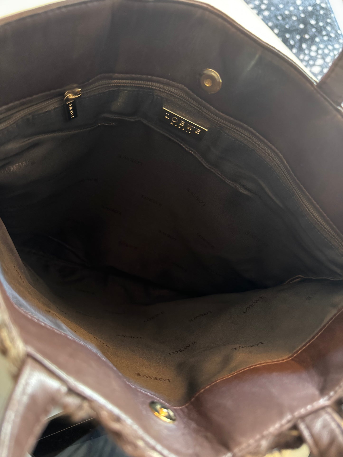Vintage Loewe fur tote in brown with leather handles, back. Inside zip