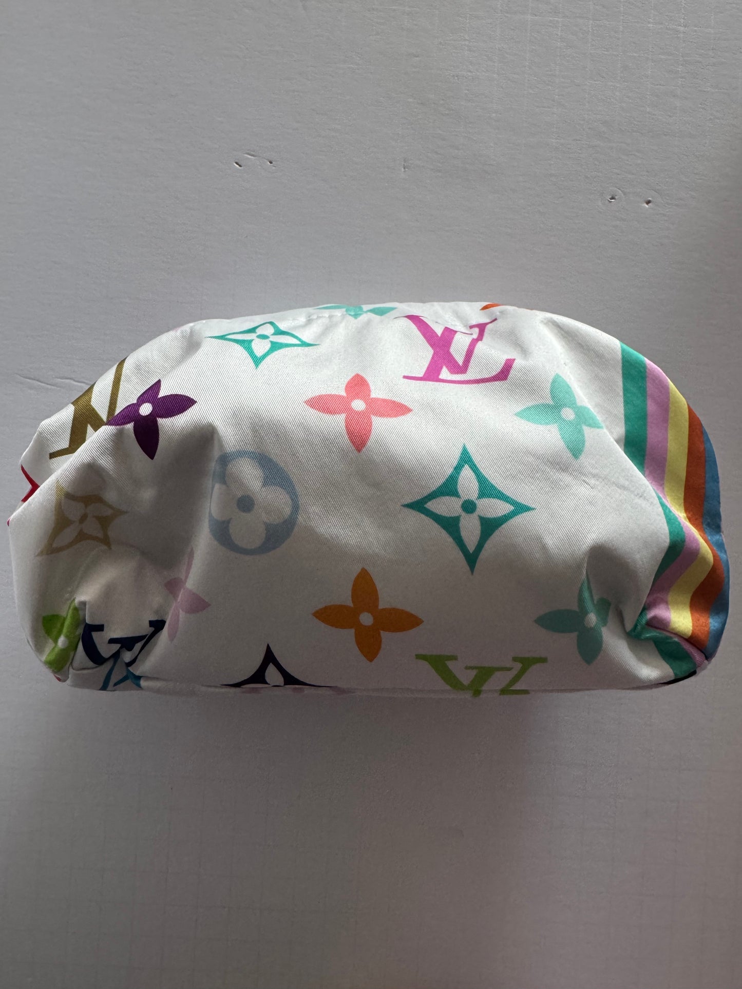 Vintage small silk scarf reimagined as a clutch bag. Comes with optional crossbody chain