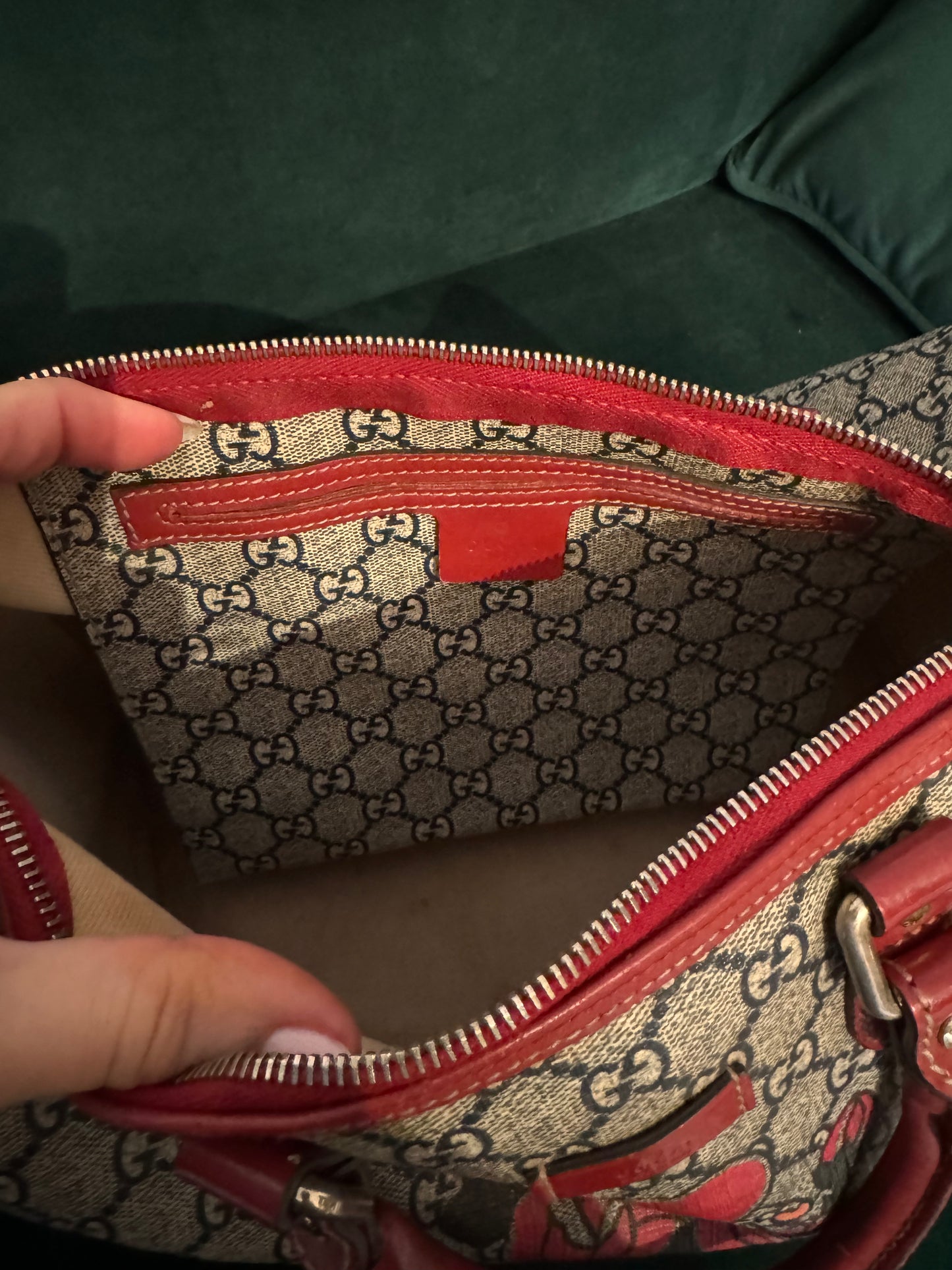 Pre-loved Gucci Boston Joy Tattoo Heart canvas with red leather top handle handbag. Comes with dust bag. Interior needs a little cleaning.