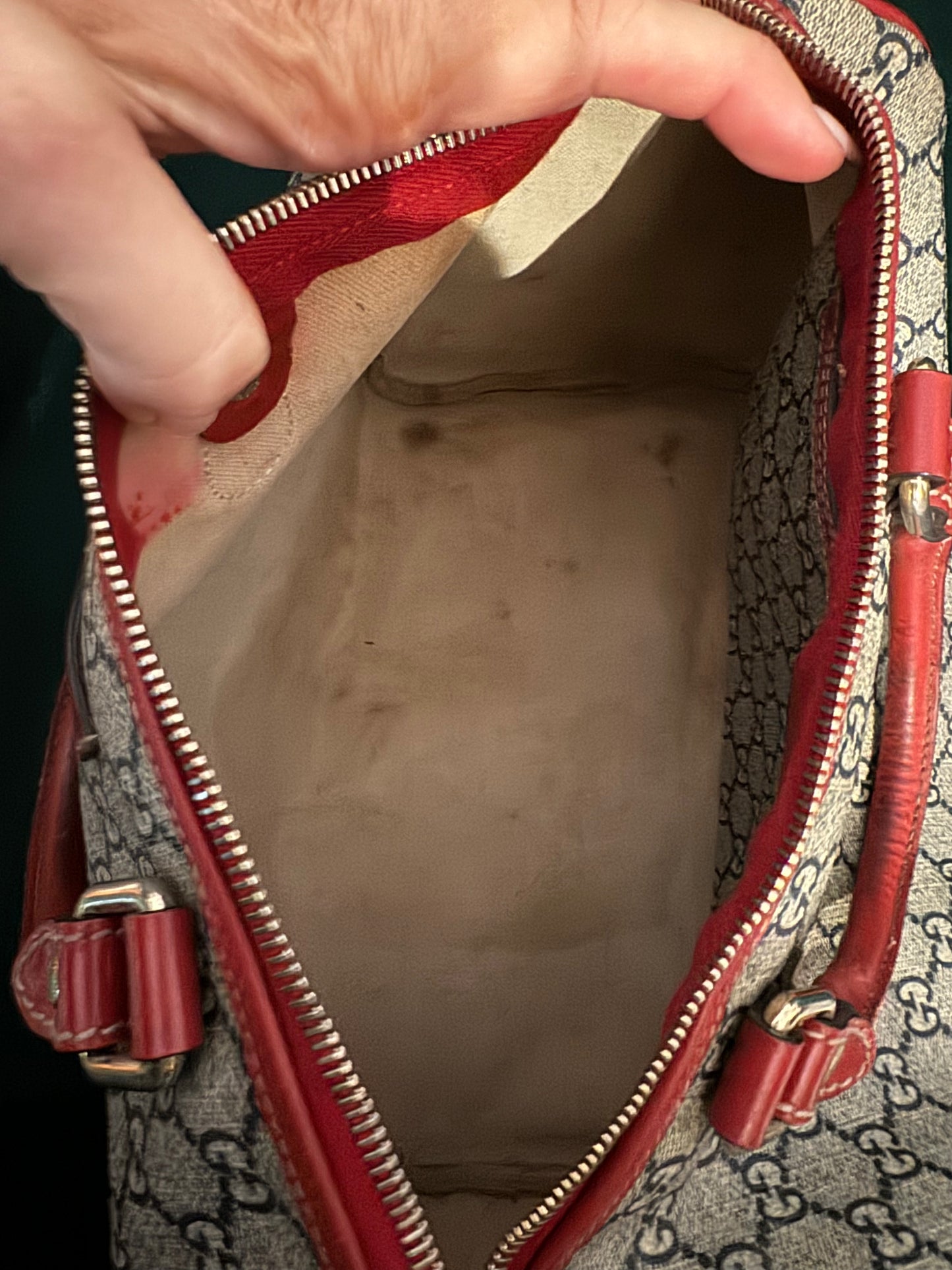 Pre-loved Gucci Boston Joy Tattoo Heart canvas with red leather top handle handbag. Comes with dust bag. Interior needs a little cleaning.