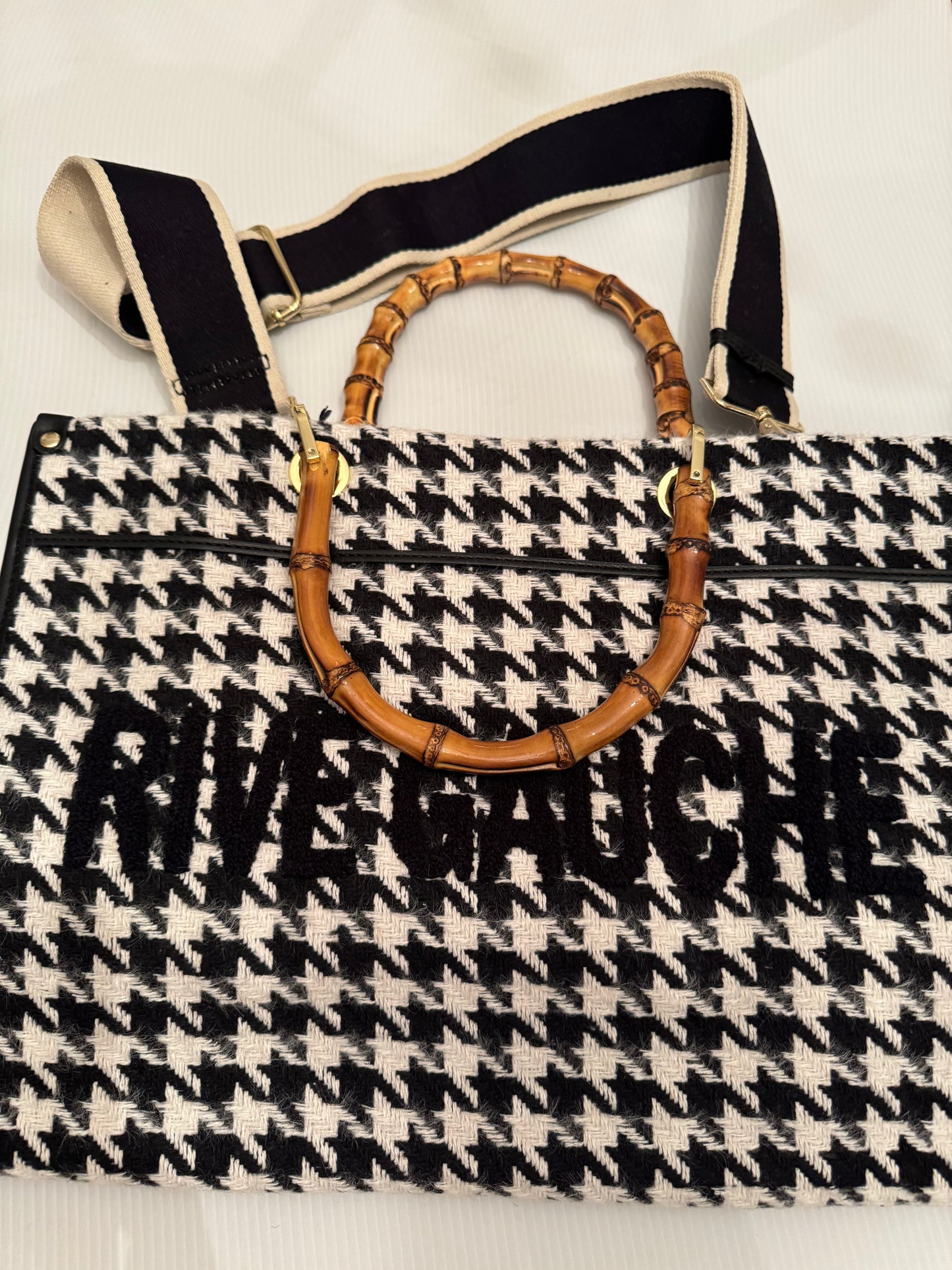 Beautiful large herringbone fabric with bamboo top handle handbag with vegan leather detailing and bottom. Sourced in Paris.