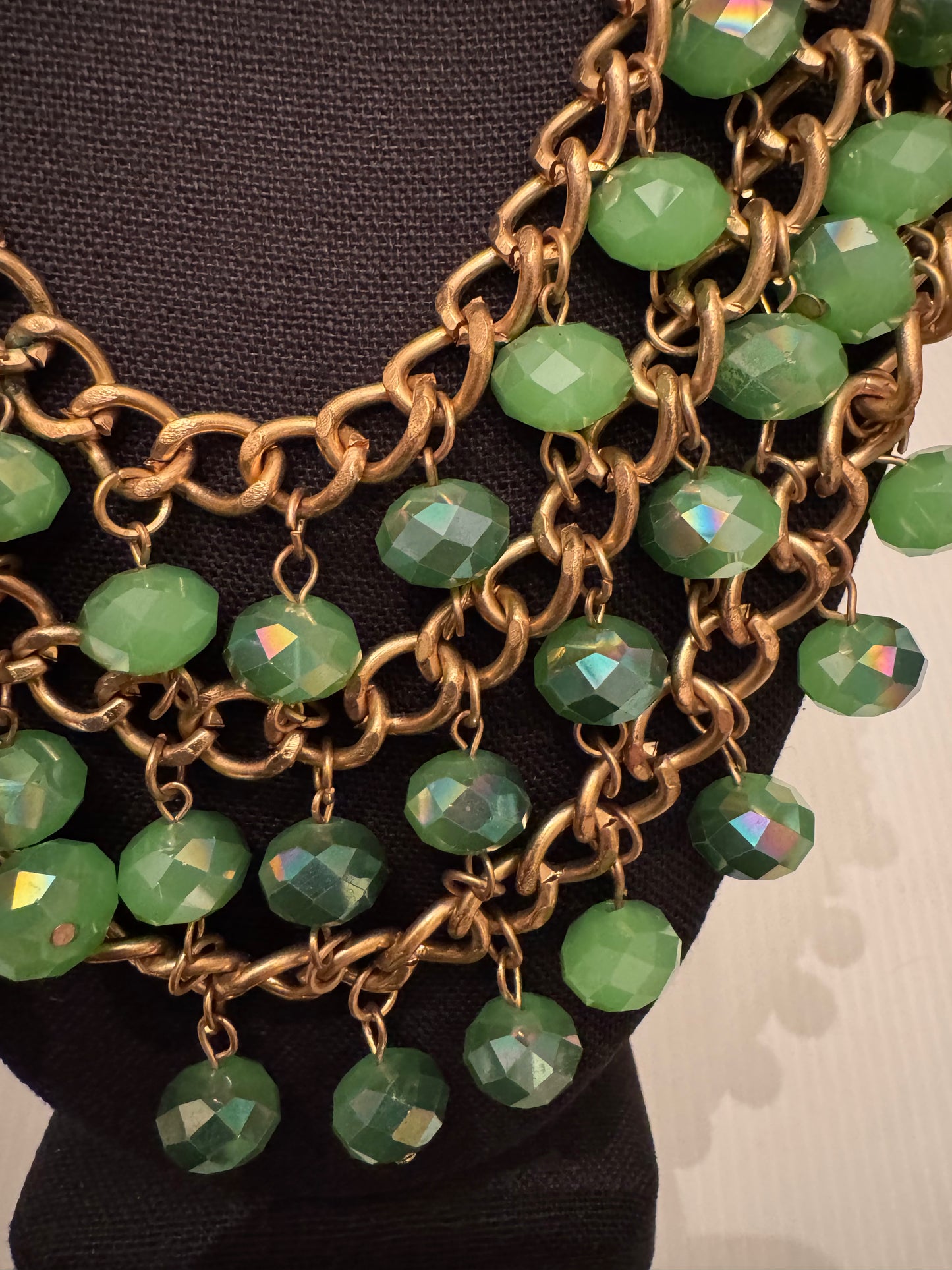 Beautiful vintage, triple strand, bronze, Stone, and green rainbow beaded bib necklace. PARIS LIVE