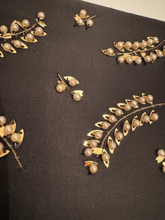 Beautiful black satin envelope clutch with embroidered pearls and gold tone leaves. France