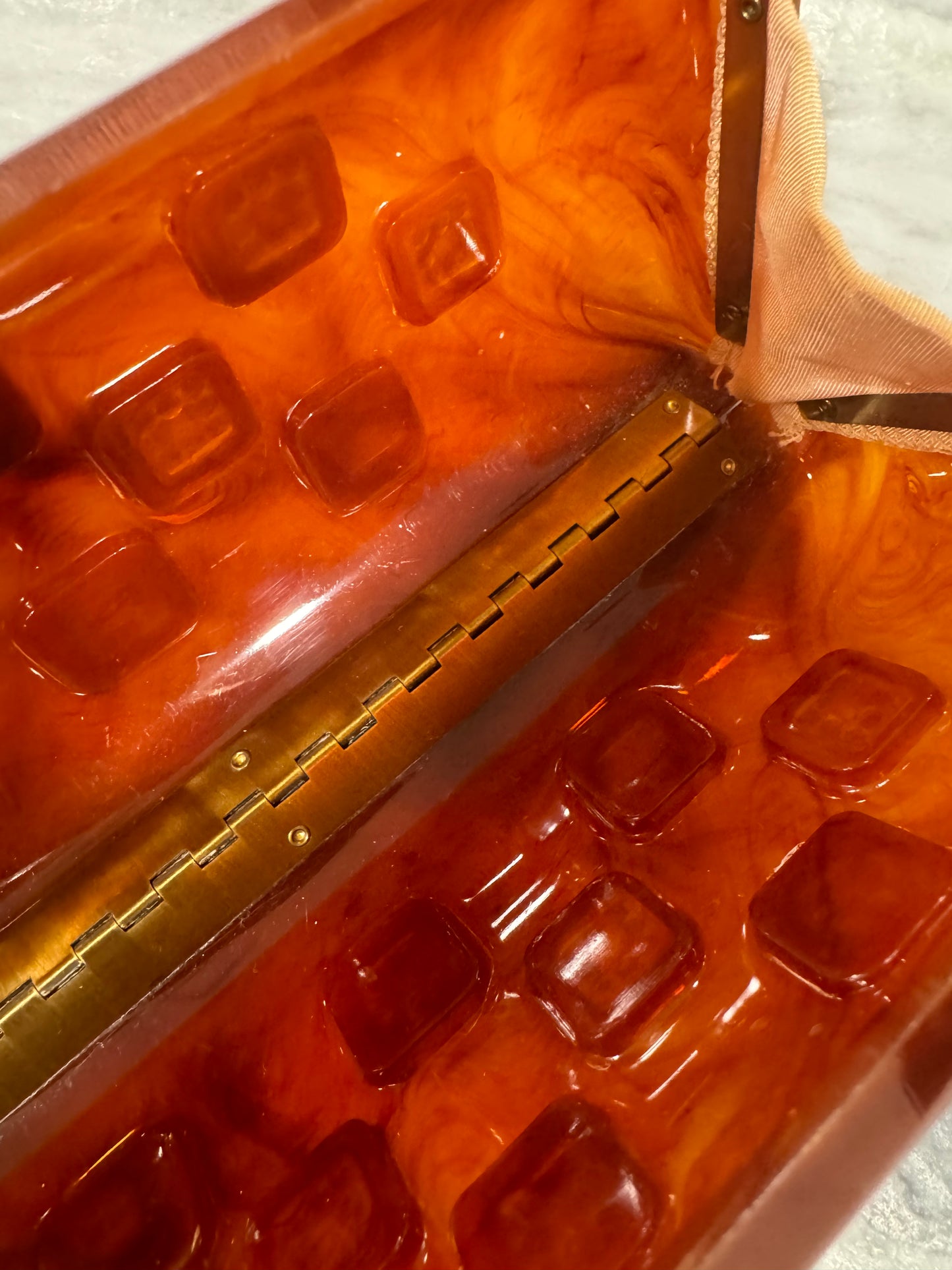 1940s tortoise lucite clutch with rhinestone detail (loose clasp 2 stones missing) Sold as is.