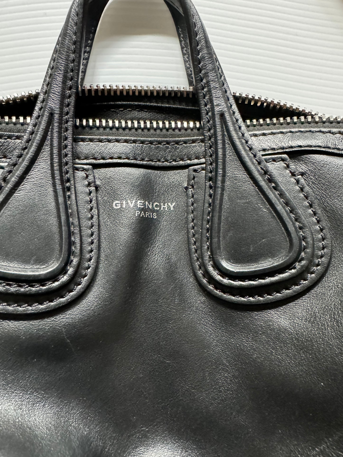 Givenchy black top handle with Givenchy Paris crossbody strap and silver hardware