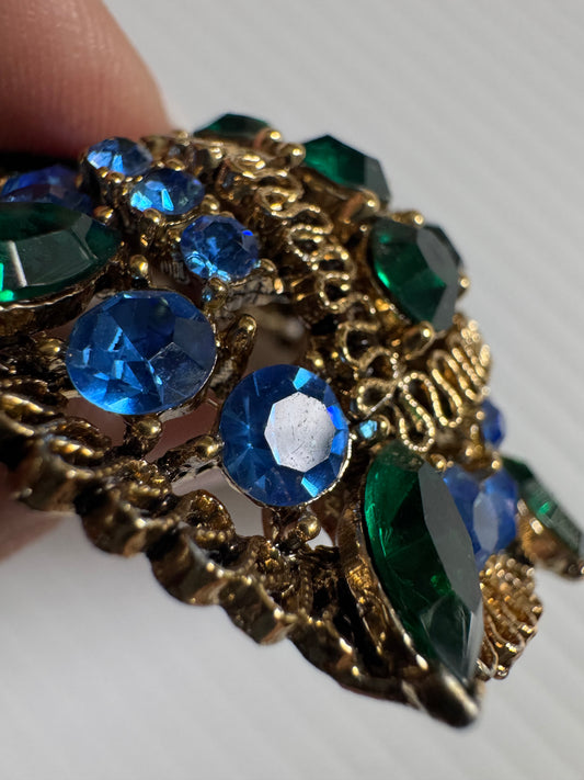 Beautiful signed Lisner 1950s gold tone dome shaped brooch with green and blue rhinestones