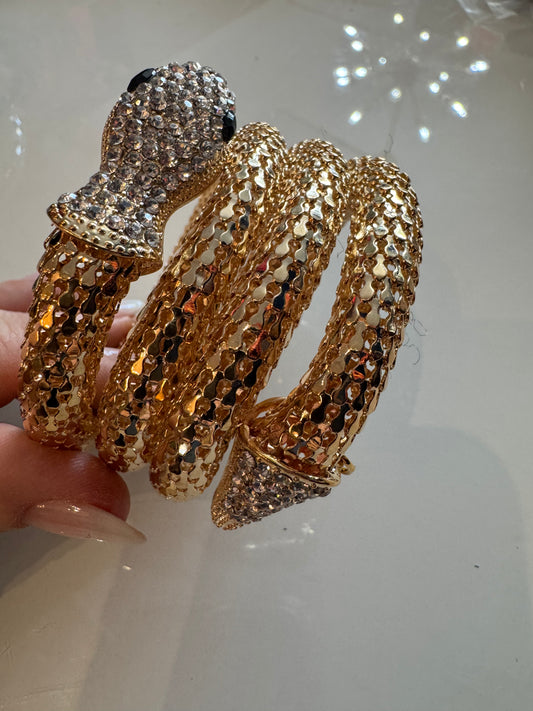 signed 1980s KJL Kenneth J Lane multi wrap, snake bracelet in gold tone with rhinestones
