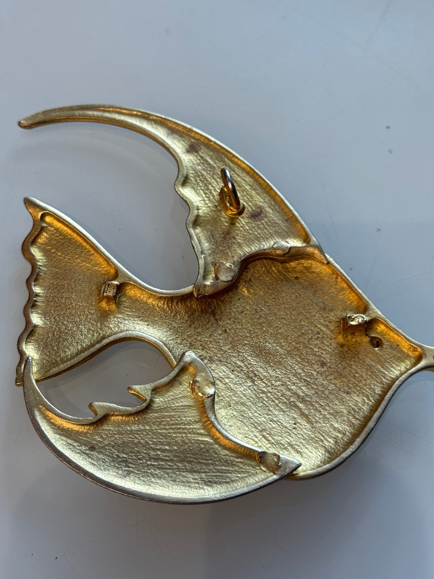Adorable jumbo 1980s angelfish pendant with red rhinestone eye. Edit to any chain or choker for a fabulous statement piece.
