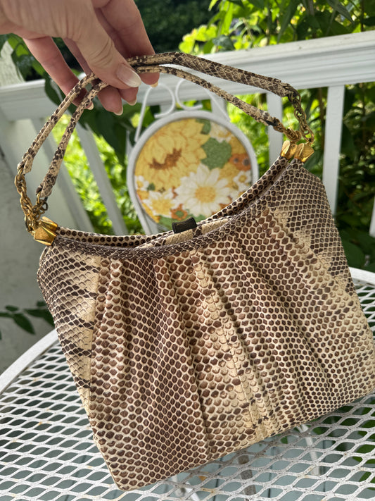 Fabulous 1960s beige colored python top handle purse with two Outside pockets, original comb mirror and coin purse by Rosenfeld