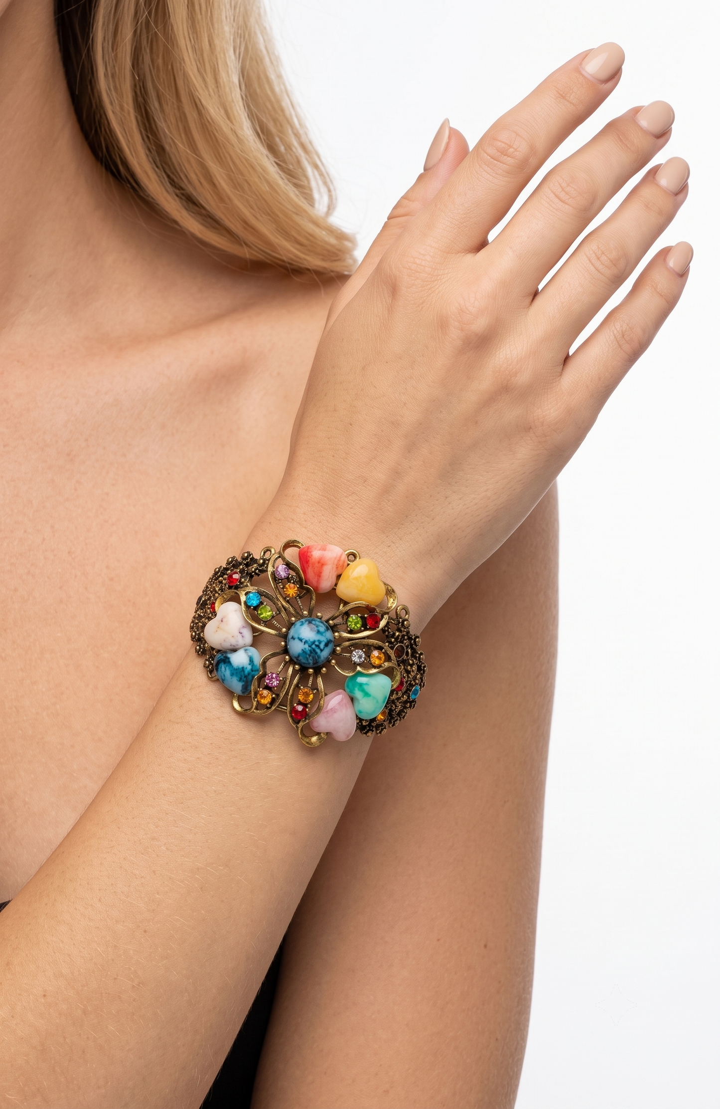 Beautiful 1980s clamper/cuff bracelet with colored rhinestones and heart shaped stones