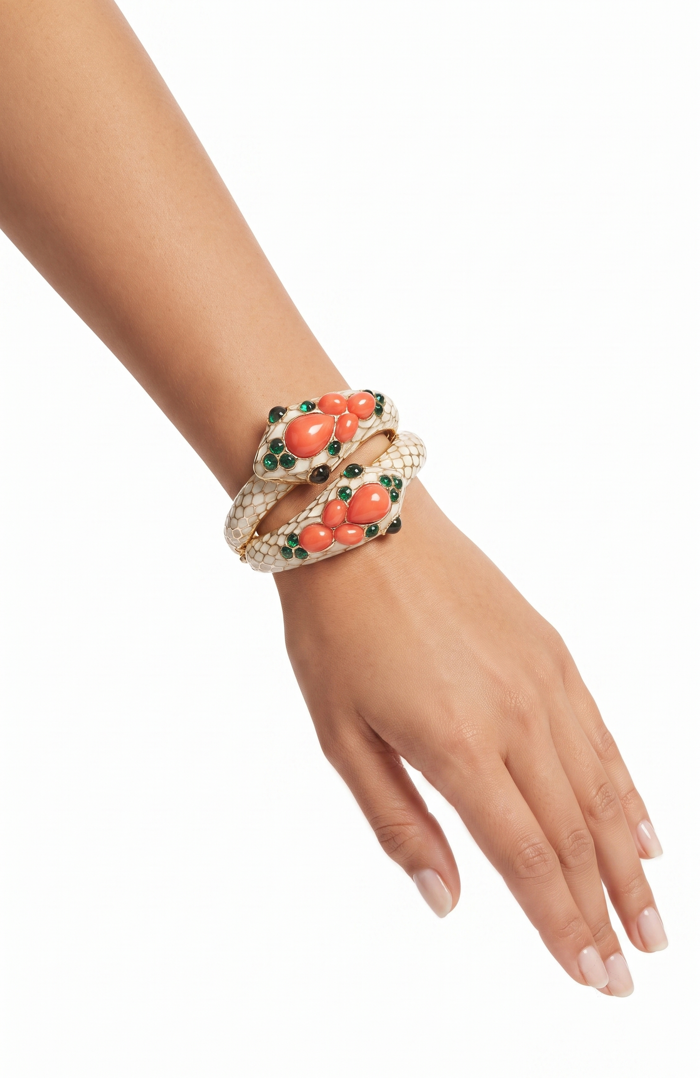 Trifari gorgeous 1968 snake clamper bracelet with green glass and faux coral cabachon stones. Unsigned from L'Orient Collection