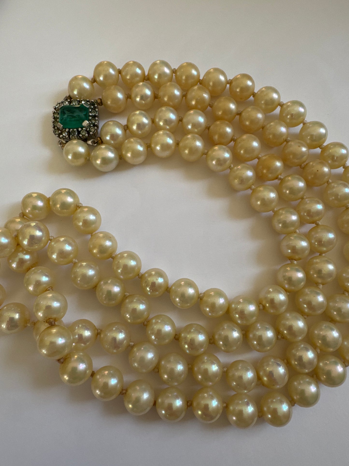 Gorgeous vintage double strand pearl necklace by CINER with emerald and rhinestone clasp