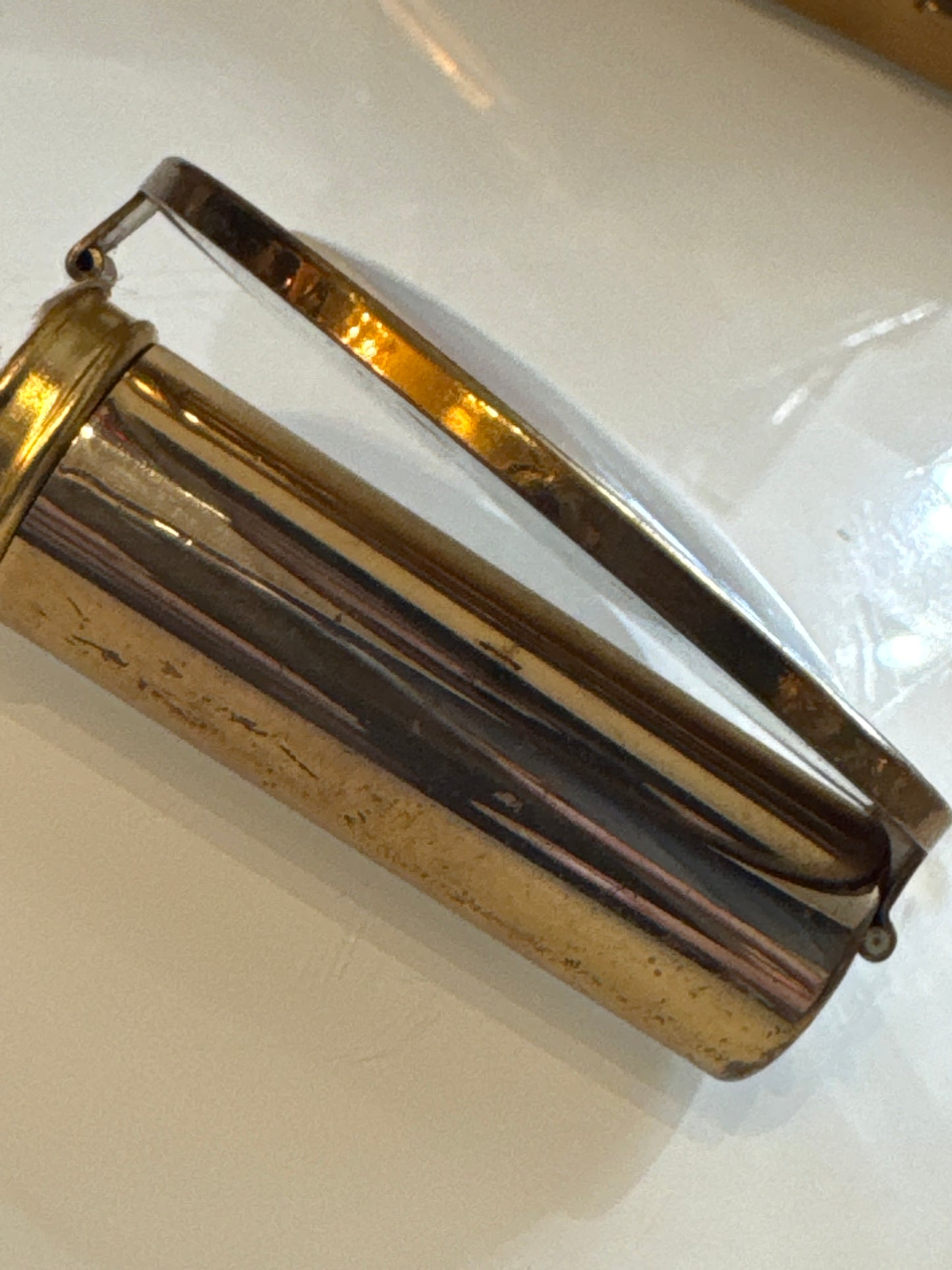 vintage refillable lipstick holder with mirror. Folds up.