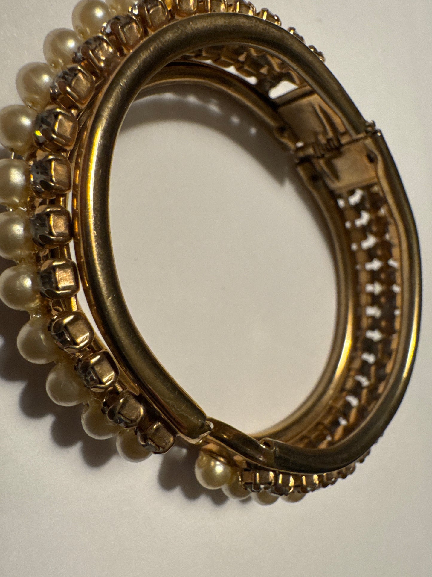 Beautiful 1950s pearl and rhinestone clamper bracelet.