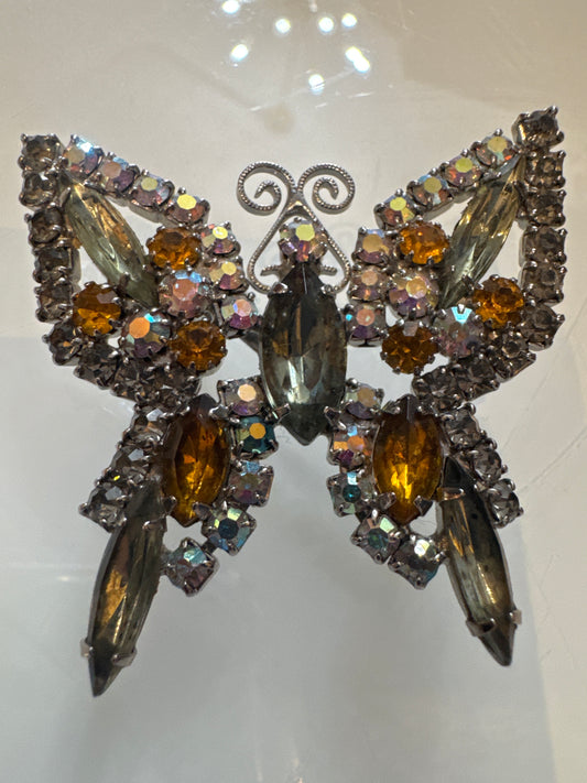 Beautiful 1950s rhinestone butterfly with amber and champagne colored rhinestones and smoky gray navettes