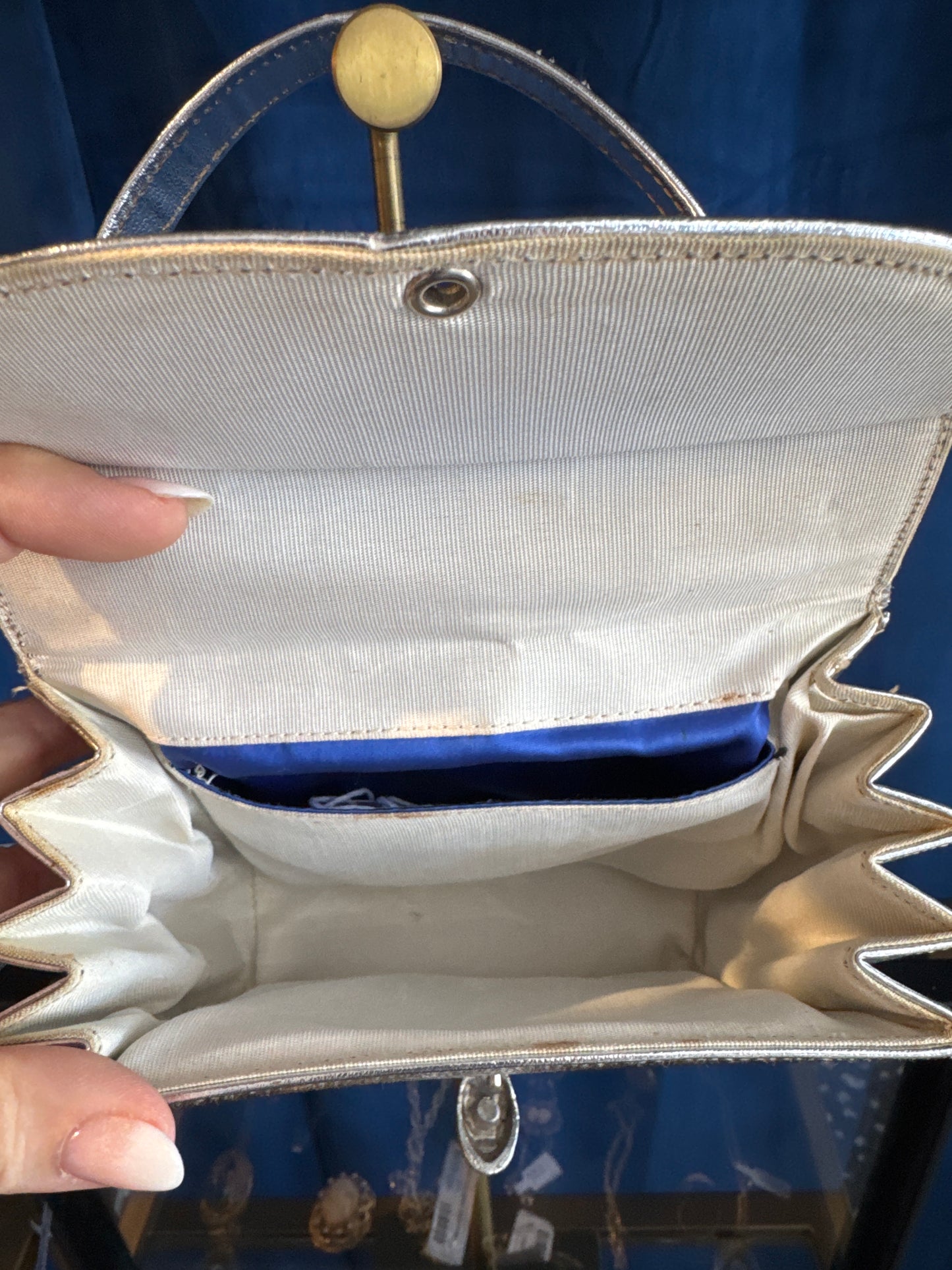 Adorable 1950s silver top handle bag with rhinestone clasp
