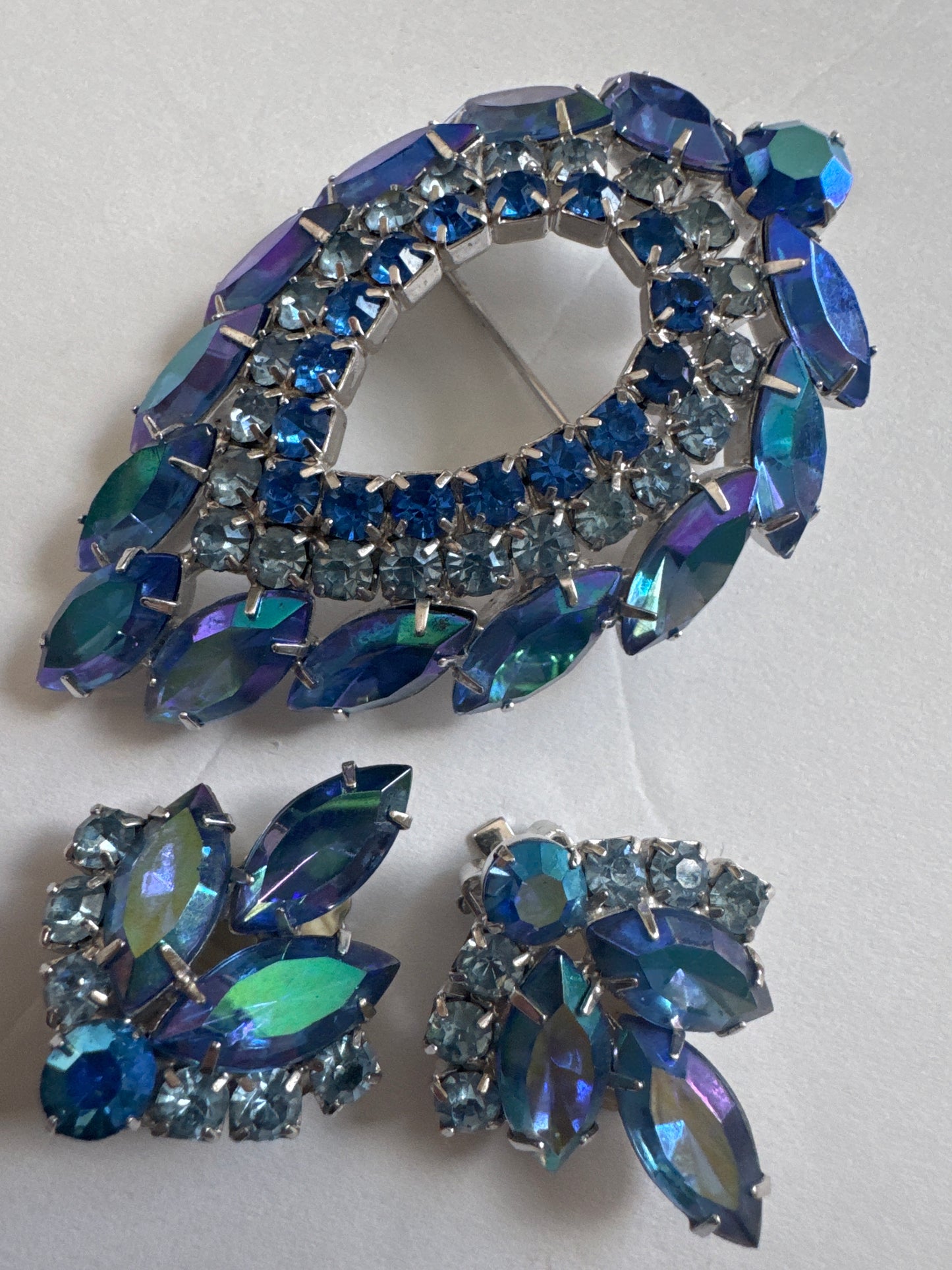 Beautiful vintage signed Sarah  Coventry blue rhinestone brooch and earring set manufactured by D & E