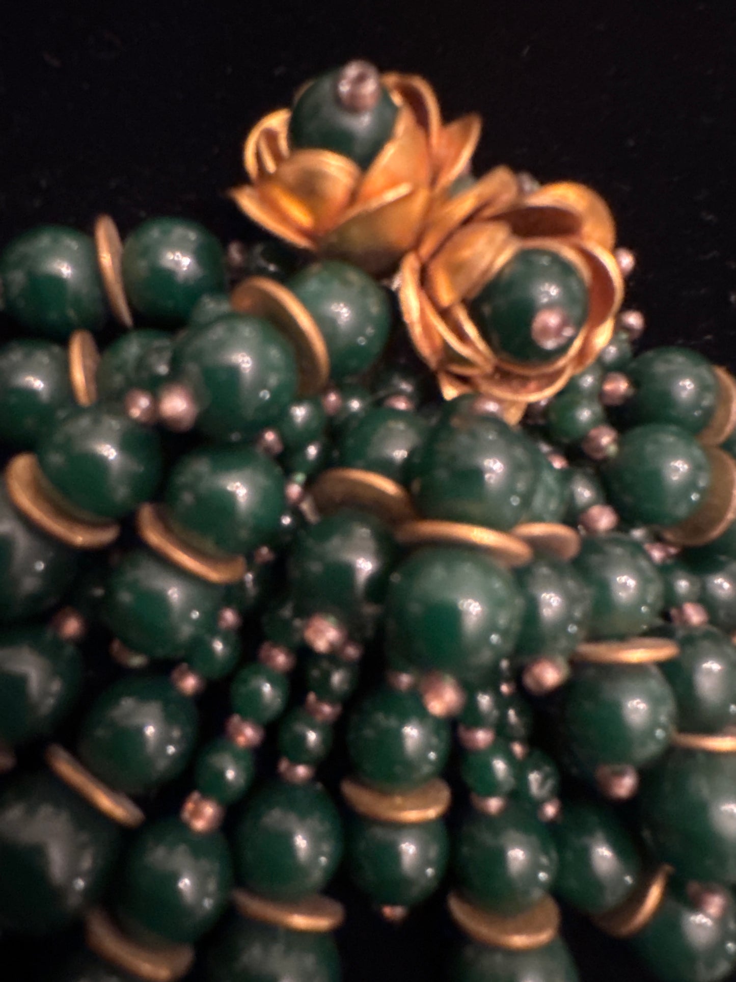 Beautiful vintage fur clip with green glass beads and gold tone flowers