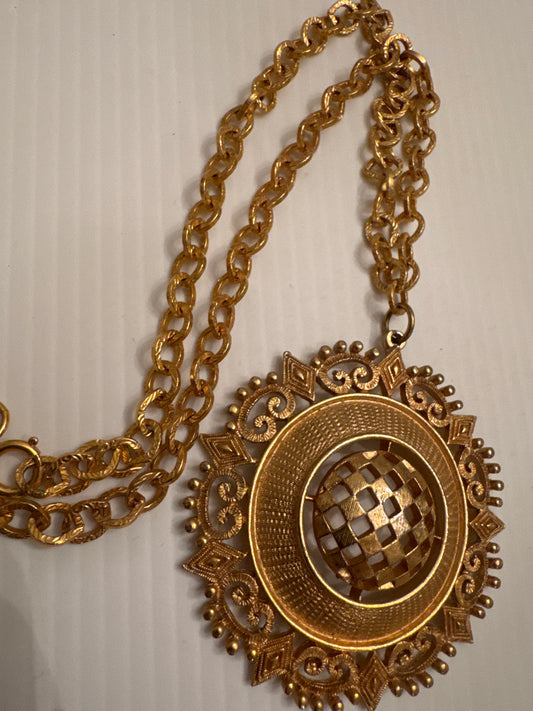 Vintage 1970s pendant necklace, gold tone disc