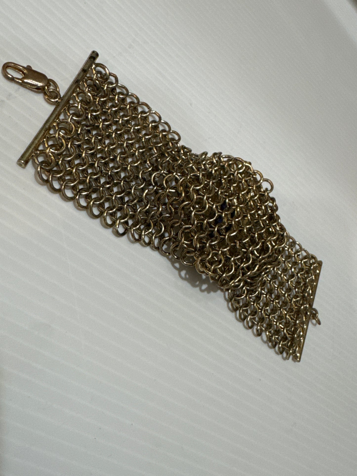 1960s gorgeous gold mesh link bracelet with blue glass cabochons. jackpot