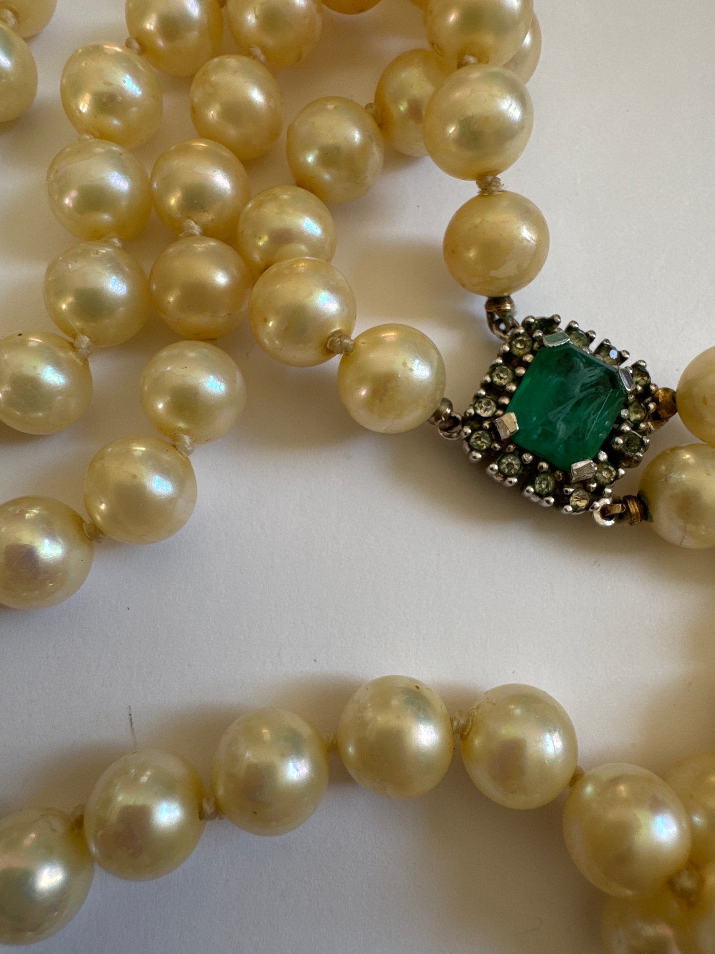 Gorgeous vintage double strand pearl necklace by CINER with emerald and rhinestone clasp